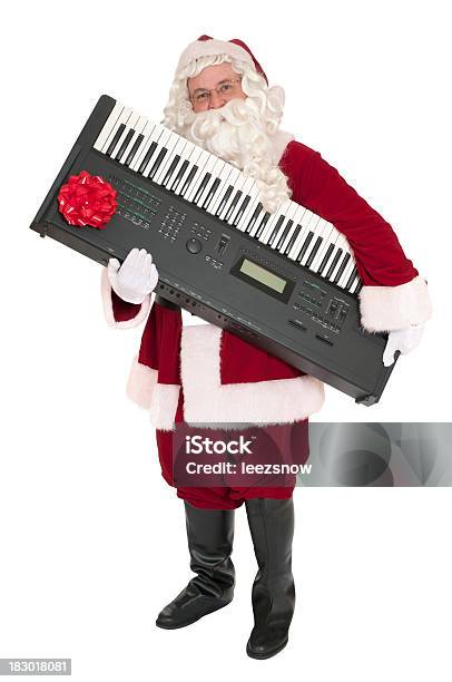 Santa Carrying A Keyboard Gift Music Series Stock Photo - Download Image Now - Piano, Santa Claus, Carrying