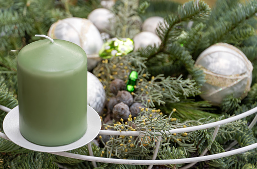 December 2023: Close-up of an Advent Wreath with green candles