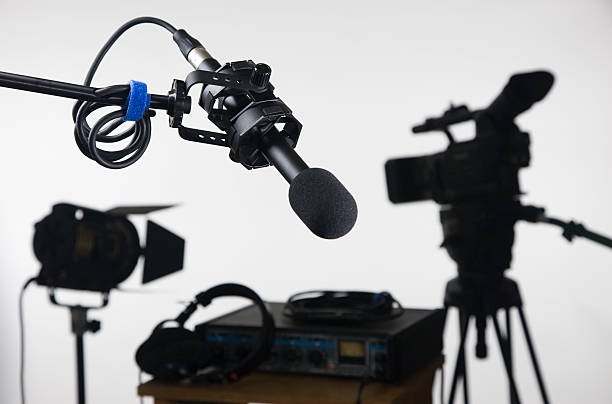 Boom microphone with mixer and video camera stock photo