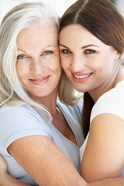 istock Mature Mother And Daughter Hugging 183018794