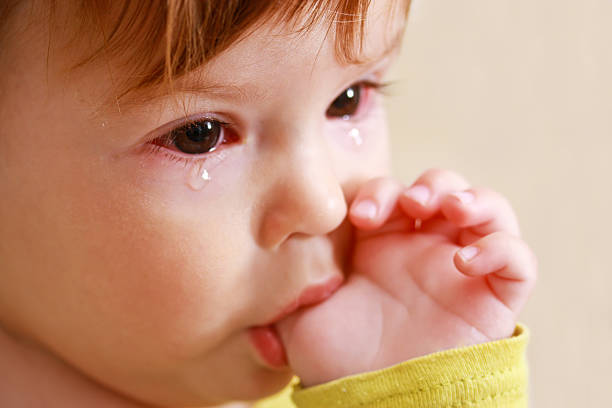 Crying baby stock photo