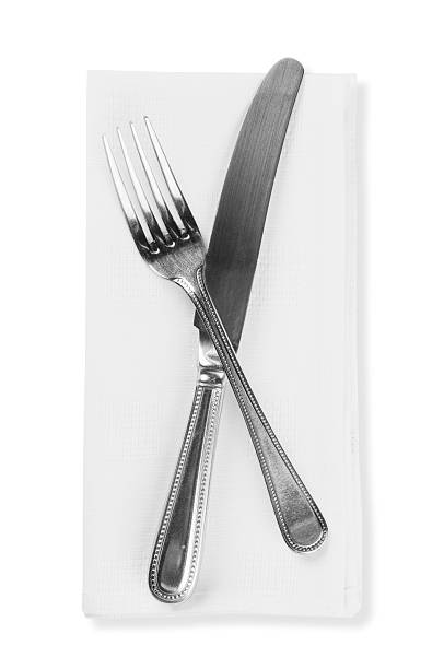 나이프, 포크 on 리넨의 냅킨 흰색 배경의 - napkin silverware textile fork 뉴스 사진 이미지