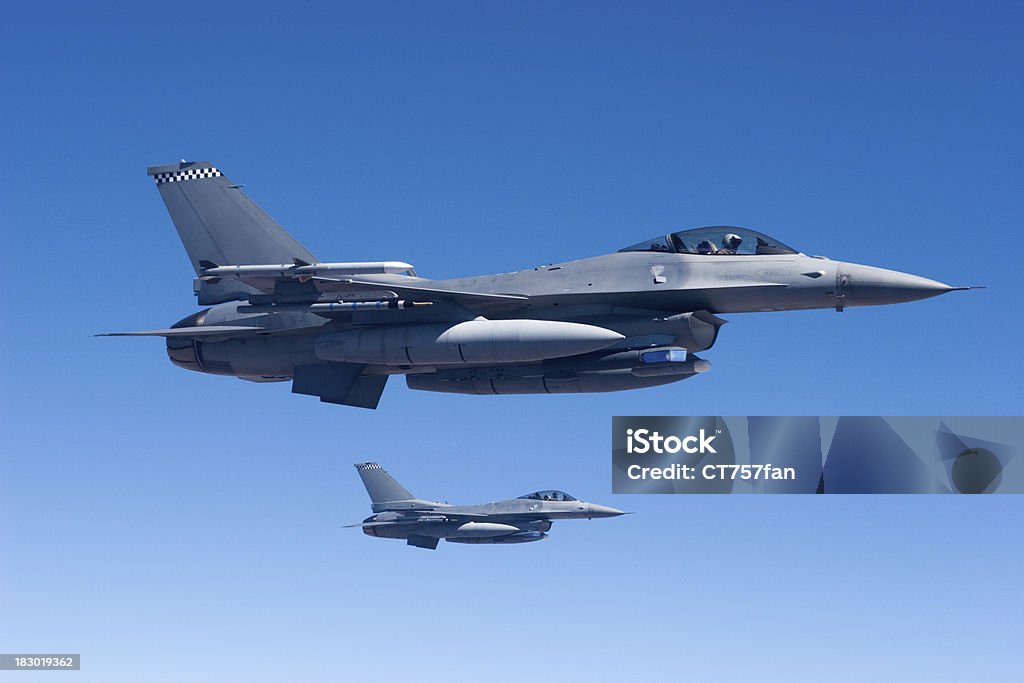 Military Jets in Flight Two F-16's in formation. Fighter Plane Stock Photo