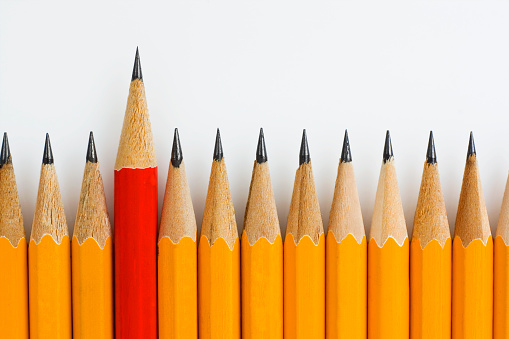 A top view of a broken pencil on a white background