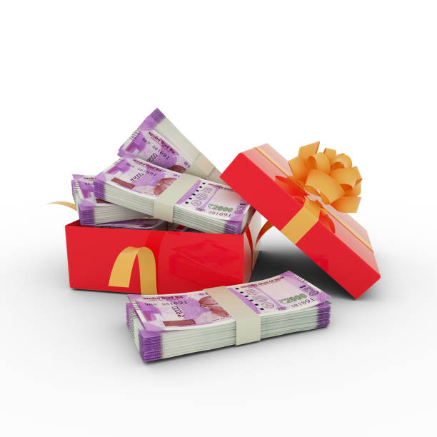 istock Stack of 2000 Indian rupee notes inside an open red gift box. Bundles of Indian rupee inside a gift box. 3d rendering of money inside box isolated on white background 1830199232