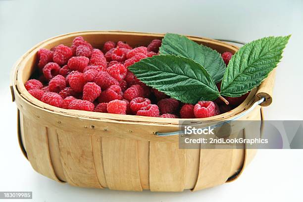 Basket Of Raspberries Stock Photo - Download Image Now - Basket, Flower, Food and Drink