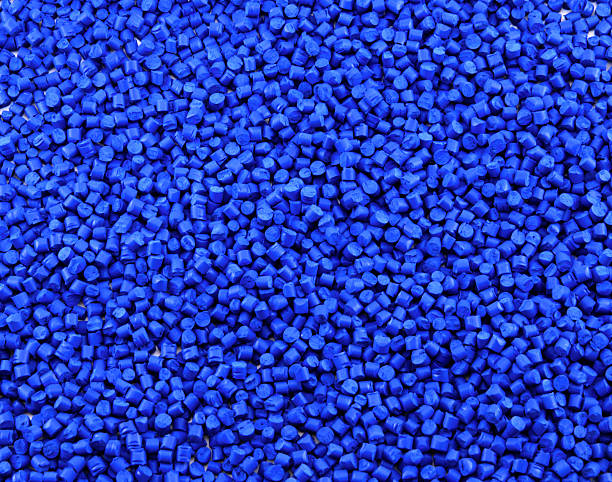 Blue polymer granules background Blue plastic/polymer granules as background.Plastics and Polymers pellet gun stock pictures, royalty-free photos & images