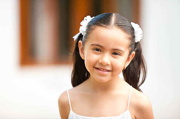 lovely little girl smiling at the camera