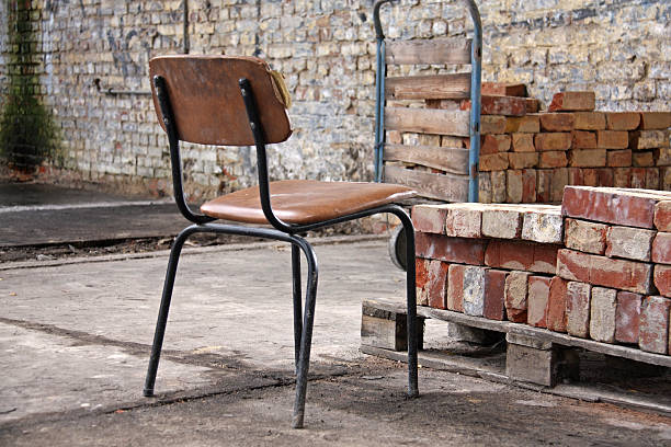 istock Abandoned factory with chair 183021137