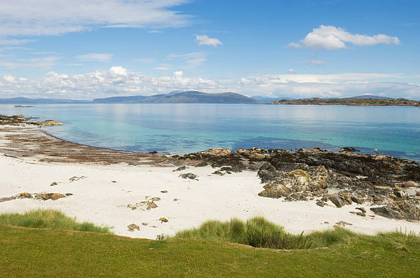 Isle of Iona "Sandy beach at the north end of the Isle of Iona, Argyll, Scotland. Space for copy." argyll and bute stock pictures, royalty-free photos & images