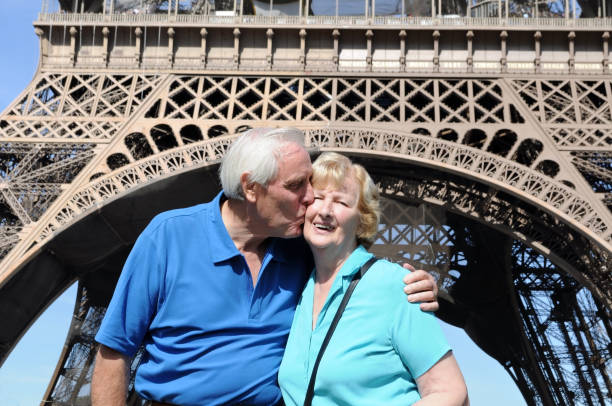 istock Senior couple in front of Eiffel Tower 183021470