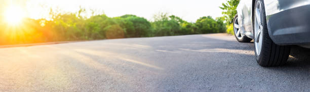 istock Car on road journey banner. Selective focus. 1830222785