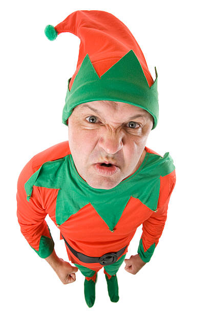 Naughty Elf A Christmas Elf with an angry mischievous expression. elf photos stock pictures, royalty-free photos & images