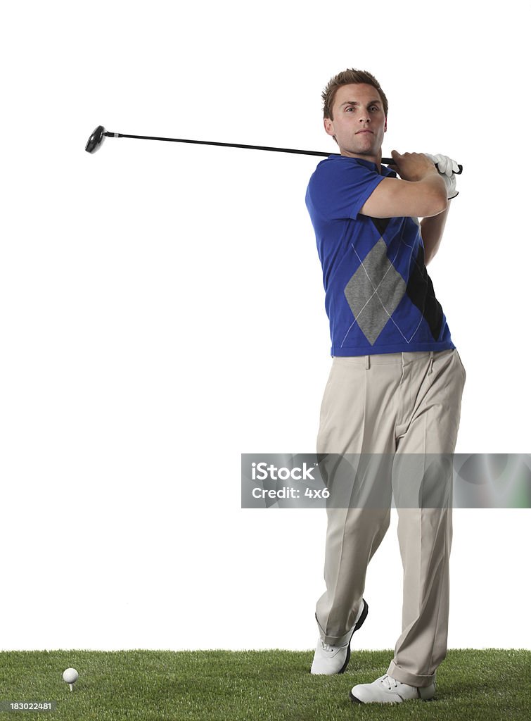 Hombre jugando golf - Foto de stock de Golf libre de derechos
