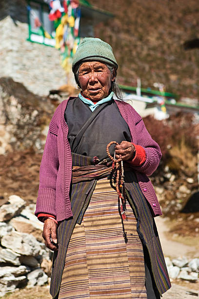 istock Nepali woman with rosary 183023006