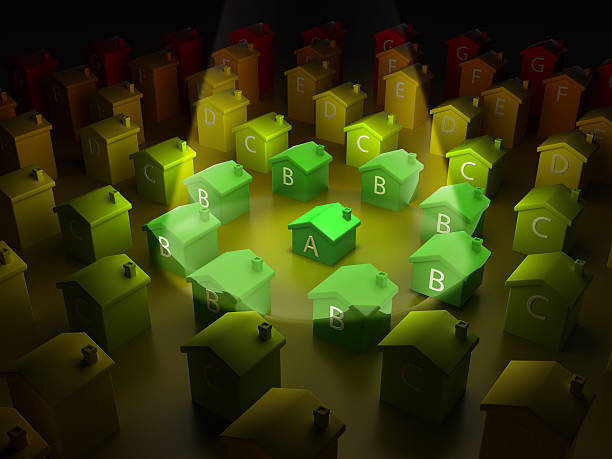 Energy efficient house -A- level energy efficient green model house highlighted among many ones. Energy efficiency concept.Similar images: 3d red letter e stock pictures, royalty-free photos & images