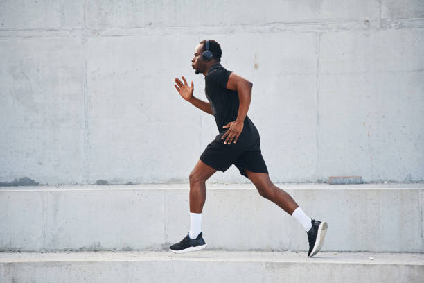 istock Active lifestyle. Sportive black man is running, morning routine 1830235853