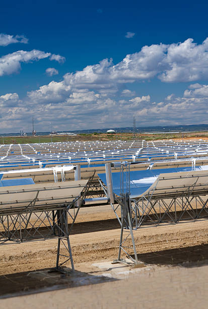 Parabolic solar trough collector "This is a CSP Solar Trough Collector utilized to generate solar power.Time of the day is noonSeville, Spain" concentrated solar power photos stock pictures, royalty-free photos & images