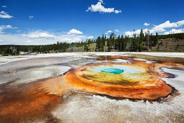 "Subject: Chromatic Pool at the Old Faithful Geyser Basin in Yellowstone National Park.Location: Yellowstone National Park, Wyoming, USA."