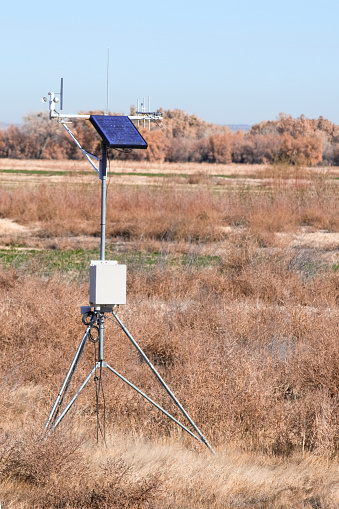 Weather station with solar panel for remote transmission of data. Bosque del Apache National Wildlife Refuge, New Mexico, USA.