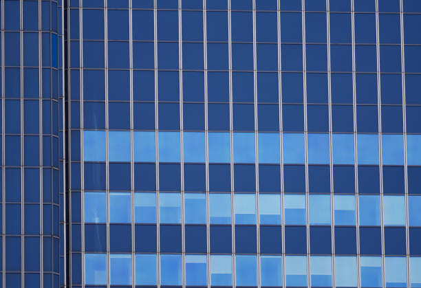 istock Facade of a building with many windows. Modern architecture. Office building. 1830251774