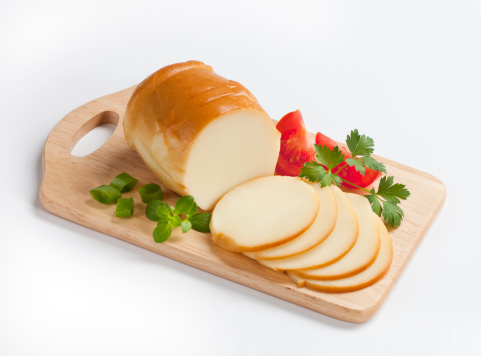 Smoked cheese on a cutting board