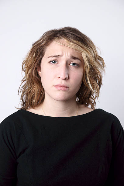 istock Young woman with an expression of sadness 183025226
