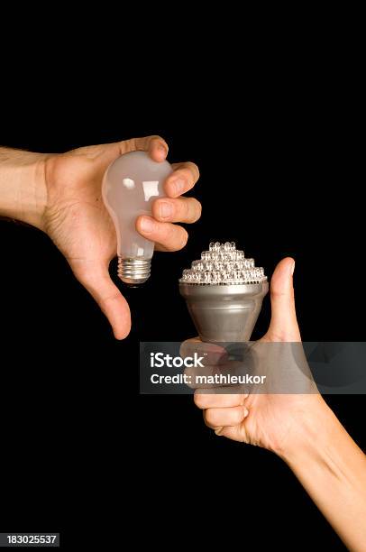 A New Led Energy Saving Argument Concept Stock Photo - Download Image Now - LED Light, Electric Lamp, Environmental Conservation