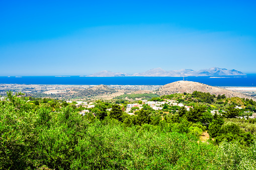 View of the landscape and the Mediterranean Sea from a mountain on the Greek island of Kos.