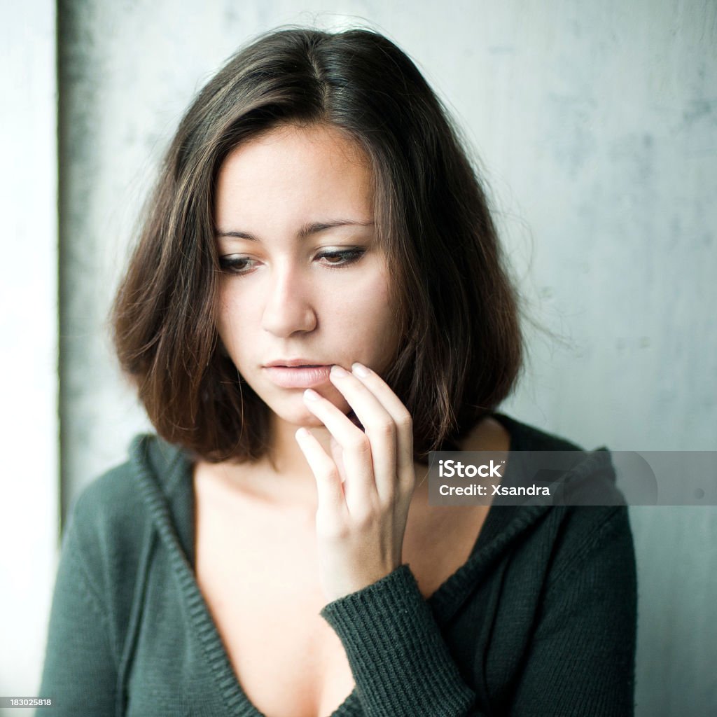 Thoughts Pensive young woman Butterflies in the Stomach Stock Photo