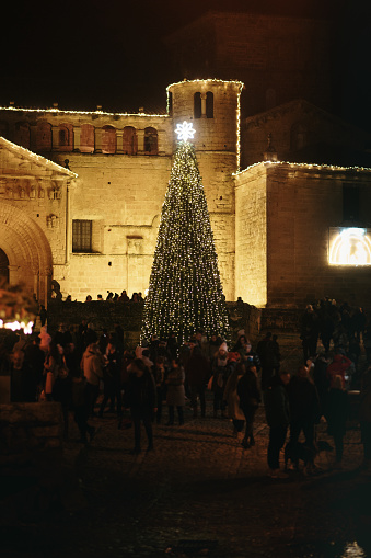 A Christmas tree at light in Santillana del Mar, a touristic medieval town in Cantabria, Spain