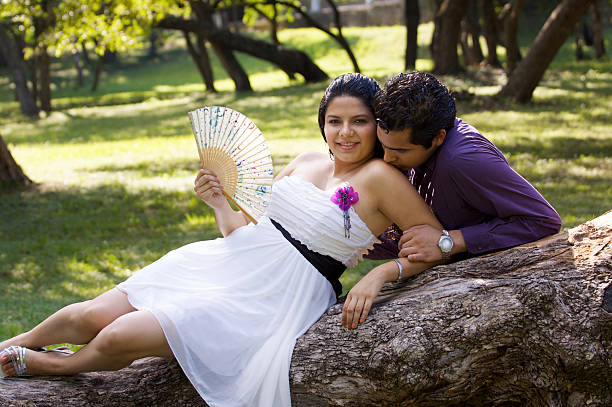 Happy couple at park stock photo