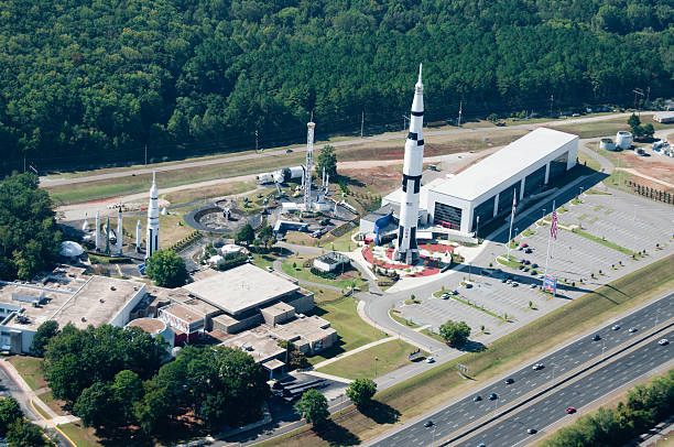 Space complex showcasing Saturn V rocket "NASA Space and Rocket Center in Huntsville, Alabama." huntsville alabama stock pictures, royalty-free photos & images