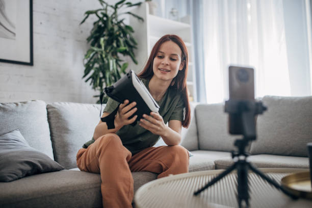 istock Female vlogger promoting product 1830277082