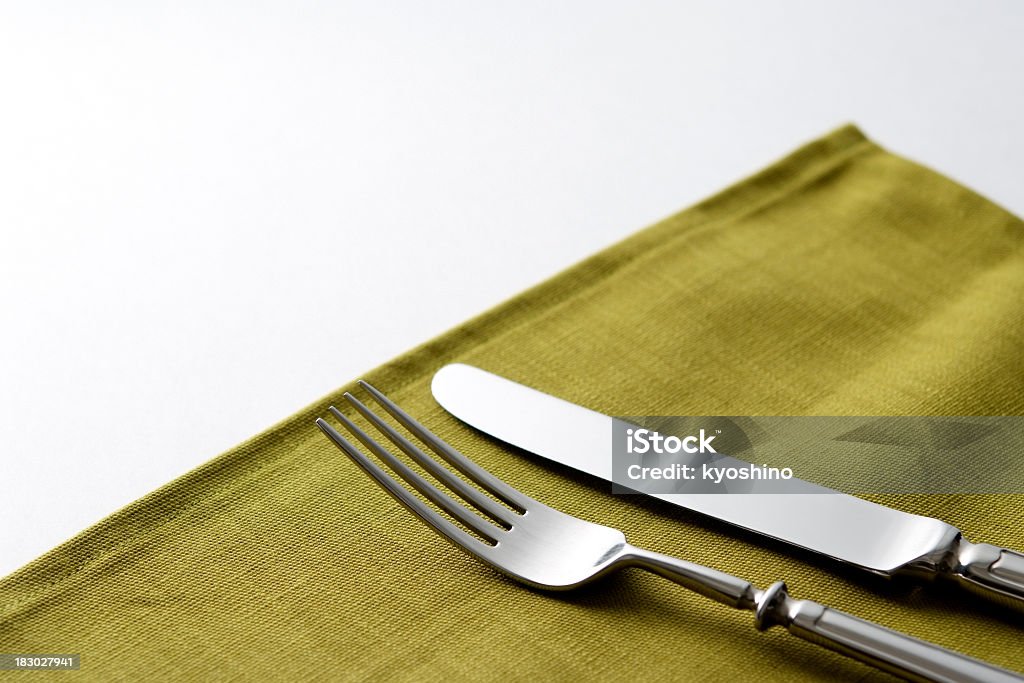 グリーンのナプキン、ナイフやフォークに白背景 - アウトフォーカスのロイヤリティフリーストックフォト