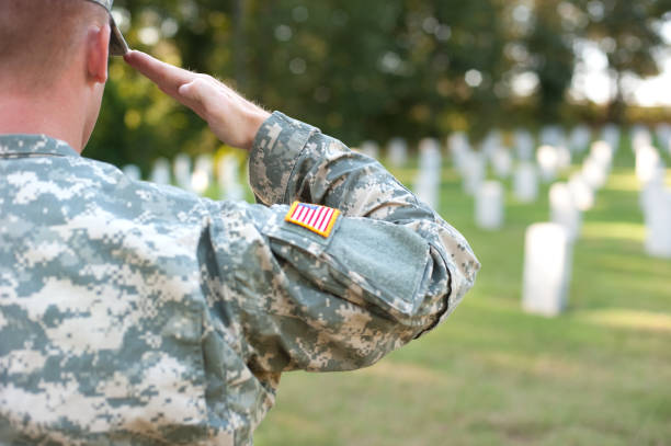 istock American Soldier Saluting Lost Friends 183028056