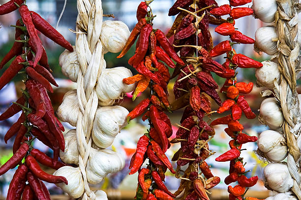 Hanging peppers and garlics.