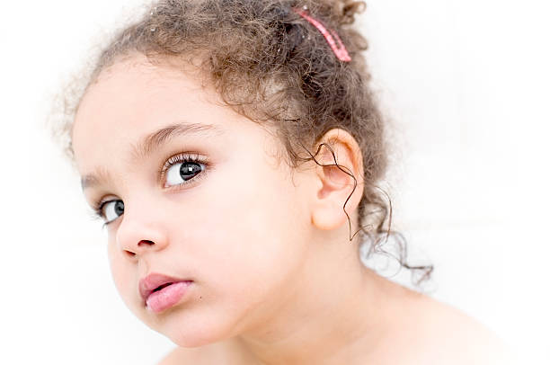 istock Girl (4-5) Looking serious, White Background 183028757
