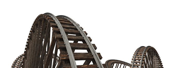 Wooden roller coaster track isolated on white.