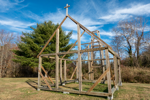 Leonardtown, Maryland USA  The Newtowne Chapel, a  symbolic wooden chapel reconstruction in wood on the St. Francis Xavier cemetery, represents the oldest Catholic church in the 13 colonies originally built in this location in 1731