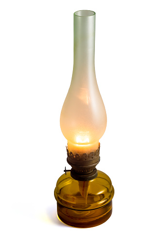 Kerosene lamp on a white background.