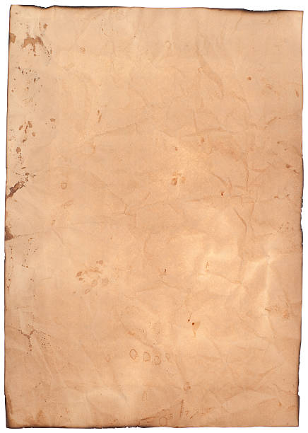 istock Burned crumpled A4 paper list on white. 183030224