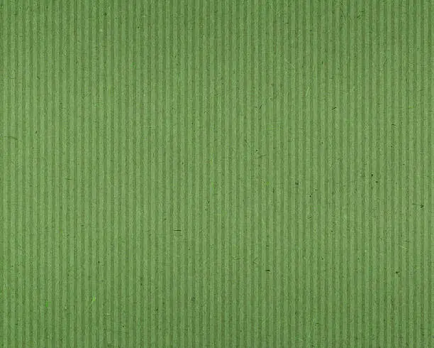 Photo of green textured paper with vertical lines