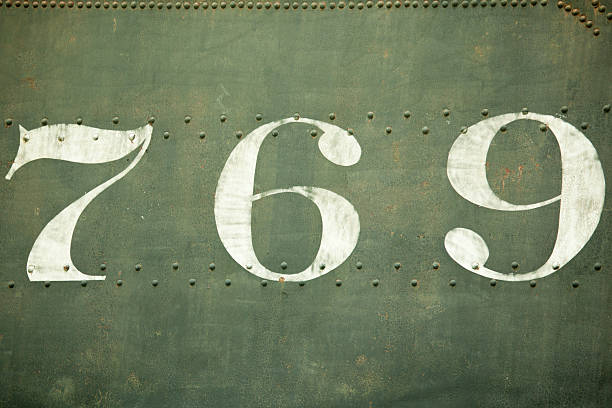 istock Number 769 On Faded Green Metal, Type 183030499