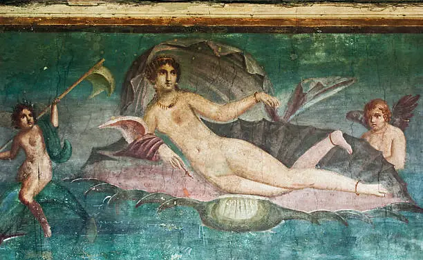 "Fresco in House of Venus, Pompeii.Pompeii is a ruined and partially buried Roman town-city near modern Naples in the Italian region of Campania, in the territory of the comune of Pompei. Along with Herculaneum, its sister city, Pompeii was destroyed, and completely buried, during a long catastrophic eruption of the volcano Mount Vesuvius spanning two days in AD 79."