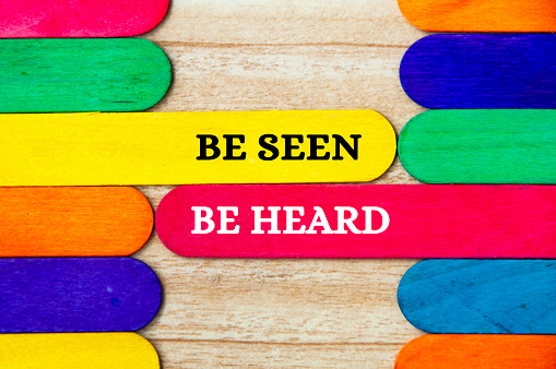 Be seen be heard text on wooden color sticks. Business concept.