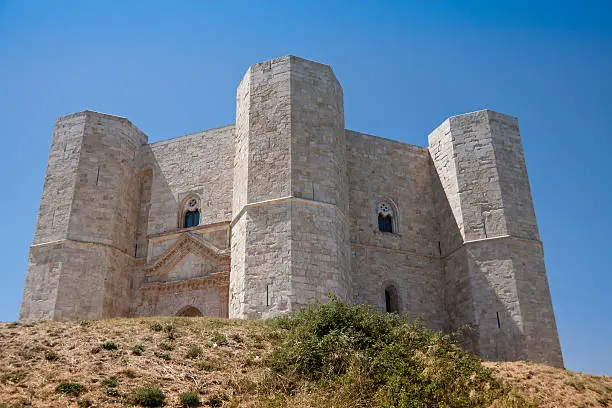 "Castle (Castel del Monte, Apulia - Southern Italy) Castel del Monte is a XIII century building built by Emperor Frederick II in Apulia (Italy), in the same name of the town of Andria. This fortress is unique for its octagonal base and has eight octagonal towers"