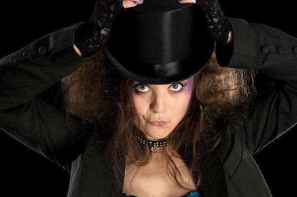istock Mad Hatter girl with hands on hat. 183032062