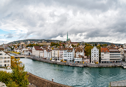 View of the historic center of Zurich from Lindenhof hill overlooking the Limmat river in Switzerland.