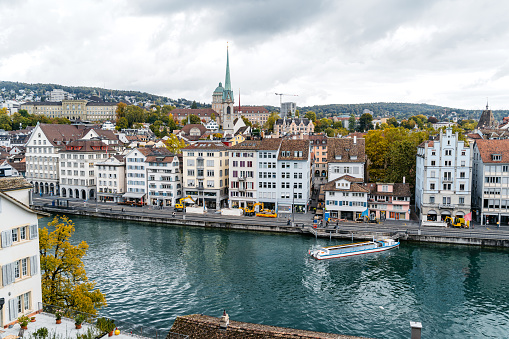 View of the historic center of Zurich from Lindenhof hill overlooking the Limmat river in Switzerland.